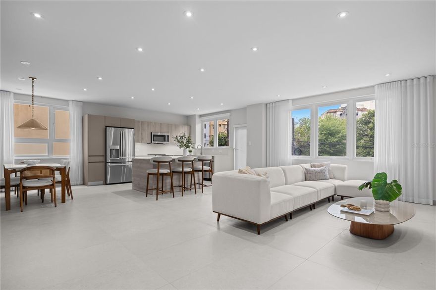 A rare full–floor residence in the heart of Miramar, this newly reimagined three–bedroom apartment delivers refined urban living within one of San Juan’s most coveted residential enclaves. Positioned in a boutique mixed-use building where the upper floors operate as a hotel, the home offers the privacy of an exclusive residence with the security and comfort of a professionally staffed property.  

Spanning approximately 2,700 square feet, the apartment has been completely rebuilt from the inside out. Every surface, system, and finish is brand new. Wide-format, neutral ceramic tile grounds the space; replastered walls create a gallery-smooth backdrop; and a full lighting plan with integrated, dimmable ceiling lights casts a warm and atmospheric glow day or night. Airy ripple-fold drapery softens the abundant natural light and elevates the apartment’s serene, contemporary feel. The entire home is fully air-conditioned, including the custom walk-in closet in the primary suite, which features its own dedicated AC unit.  

Designed by a leading local interior designer, the residence is offered beautifully furnished and styled. The kitchen is sleek and modern, anchored by warm, neutral cabinetry, white quartz counters, and GE Monogram appliances. A matching wet bar enhances the living area, ideal for hosting. Each of the three bedrooms is ensuite, with bathrooms that echo the home’s clean, natural, modern aesthetic.  

Miramar remains one of Puerto Rico’s most desirable urban communities, known for its cultivated residential character, peaceful streets, and uncommon walkability. This location offers a balanced city lifestyle centered on comfort, neighborhood identity, and access to the area’s best dining, culture, and waterfront paths, all without the crowds of the more tourist-driven districts.  

Additional features include two parking spaces, a full power generator that covers the entire building, a water reserve tank, and 24-hour security and staff presence due to the hotel component above. A shared rooftop space, scheduled for completion in Spring 2026, will be operated by a local coffee shop and will offer residents and guests extraordinary views of the ocean, lagoon, and surrounding cityscape.  This is modern Miramar living at its most polished – turnkey, thoughtfully designed, and exceptionally comfortable.