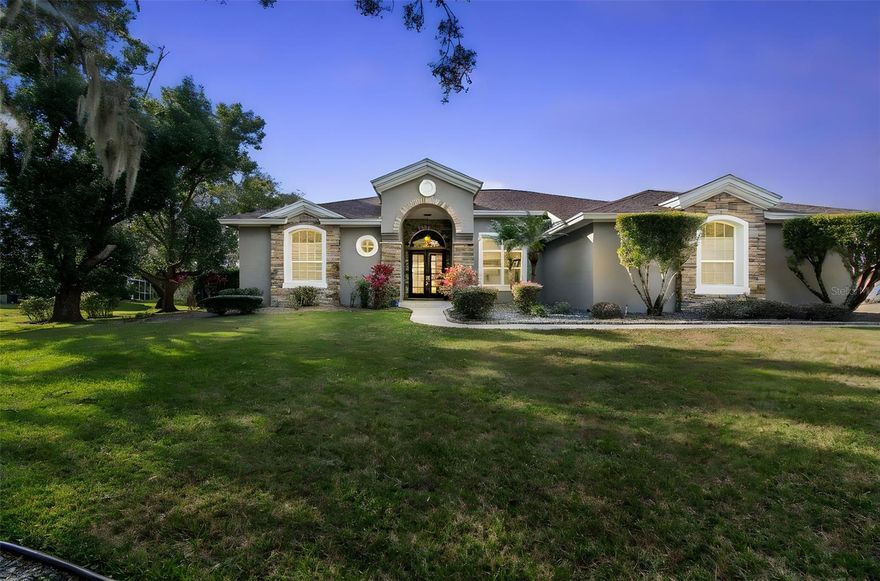 Welcome to the neighborhood of Quail Ridge!  Located approximately 30 minutes north of Tampa and close to the Veterans Expressway.
Once you enter this stunning neighborhood, you will notice lovely tree-lined streets and estate homes on larger property parcels with stunning
views of water and conservation areas.  Located at 12147 Quail Ridge Drive sits an amazing 1998 home built by the highly acclaimed Arthur
Ruttenberg. The home exterior is stucco and stone with mature landscaping showing off its large property of 1.45 acres.  This gem gives you plenty of space in the front yard as well as the backyard.  This home offers an oversized 3-car garage, and the driveway has plenty of room for additional parking for large gatherings.  As you enter, you will immediately notice the open floor plan, high ceilings, and sparkling outdoor pool and overflow spa with views of the pond and trees. This home offers 4 large bedrooms, 3 full bathrooms, an office/bonus room, an amazing kitchen, a formal dining room,  fomal living room, and a huge family room...This kitchen is the heart of this home! As you come through the glass French doors to an open kitchen, it will take your breath away due to the beautiful white cabinets, quartz countertops, and stainless steel appliances, including a huge island that is conducive to all of your entertaining events. There is a eat in area with a clear glass view of your lovely screened-in pool and lanai area.  Off the kitchen is a huge laundry room with additional storage space as well as a huge walk-in pantry. There are two bedrooms and a full bathroom behind a private pocket door next to the family room. In the rear of the home is another private bedroom and a full bathroom with a view of the backyard and pond.  The office/bonus room has full sliding doors opening up to the pool area and a full view of nature, including the sand cranes, turtles, birds, and deer. This home has all you could want, such as: 6 separate AC zones, 2 electrical panels, smart garage opener, new water softener 2025, 2025 hydrojetting house pipes, 2025 Small & Large pool pump replaced, Pool Salt cell replaced, firepit pavers 2025, Brand new dishwasher Dec 2025, New Luxury Vinyl plank flooring.  Roof 2020.  Quail Ridge is an amazing neighborhood within distance to all Tampa has to offer, yet offers peaceful estate living.  Hurry and schedule your showing today!!