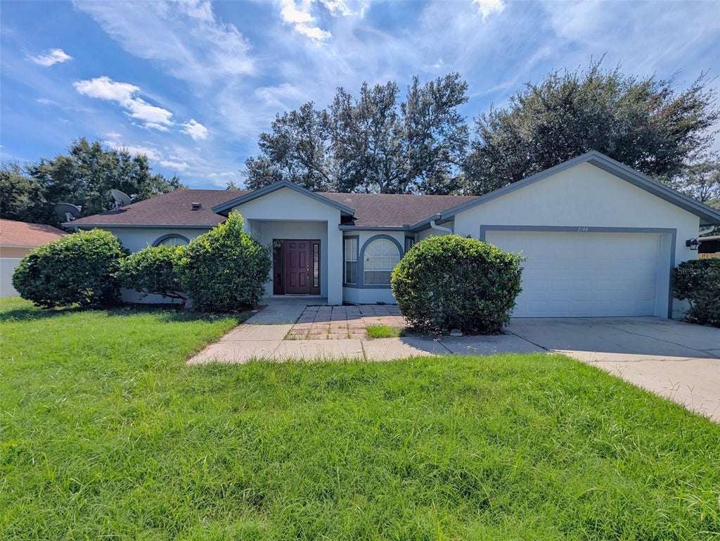 Photo of 7144 Ironwood Drive, Orlando, FL 32818 (MLS # O6452927)