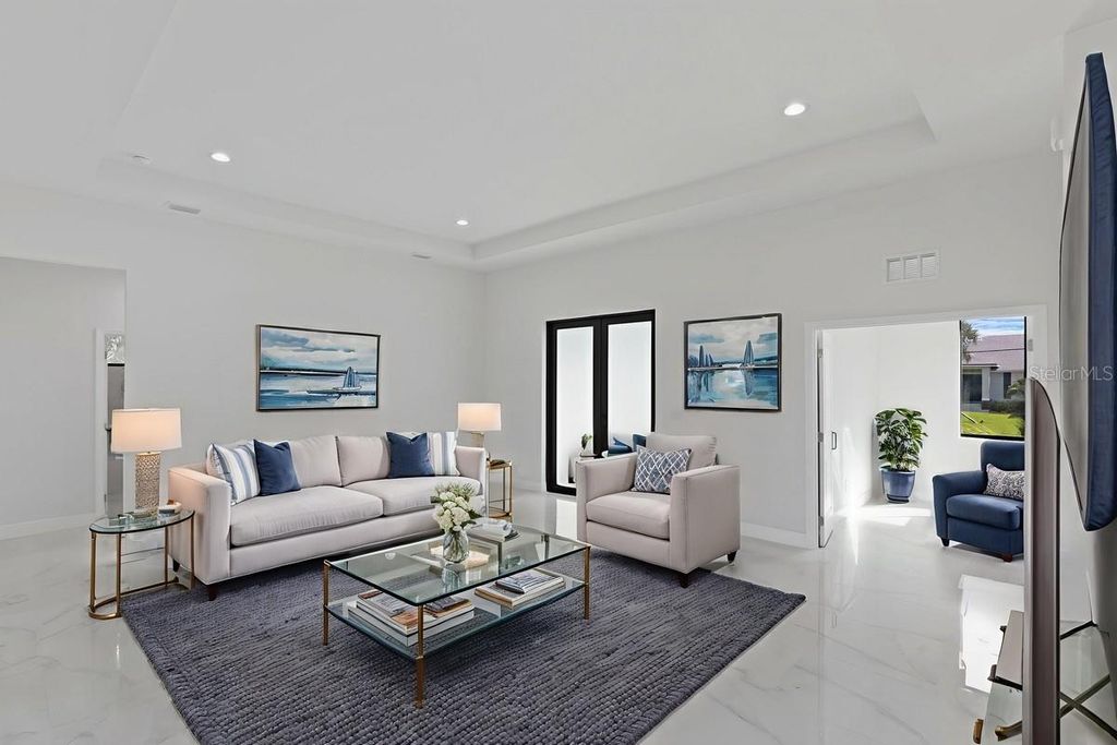 Photo of 44 Tournament Road, Rotonda West, FL 33947 (MLS # O6315550)