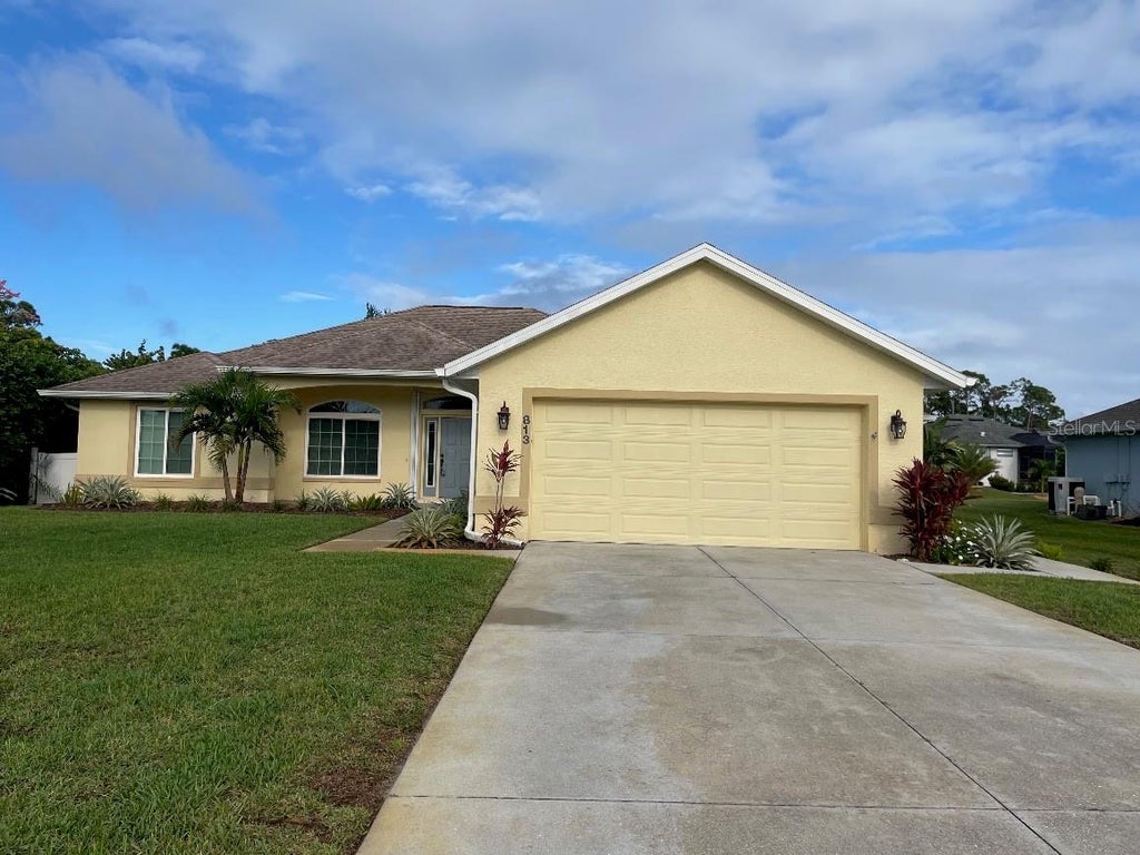 Photo of 813 Boundary Boulevard, Rotonda West, FL 33947 (MLS # C7531527)