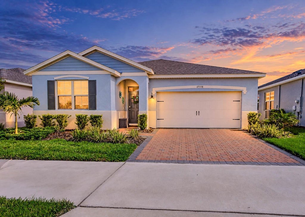 Photo of 17558 Blazing Star Circle, Clermont, FL 34714 (MLS # O6440280)