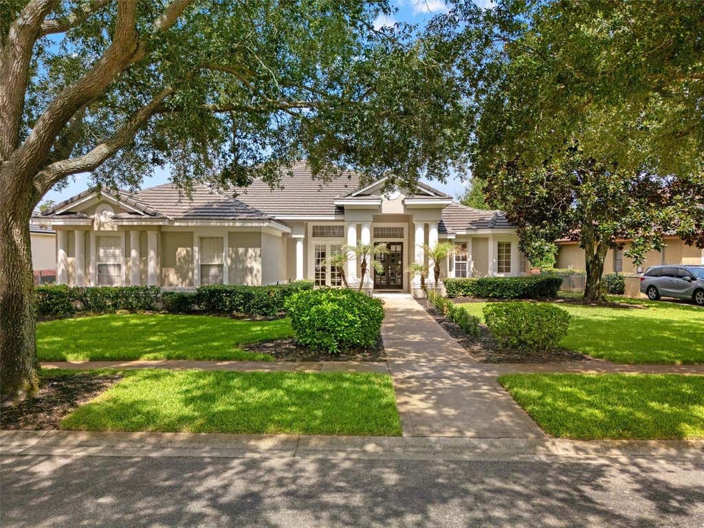 Photo of 10821 Boca Pointe Drive, Orlando, FL 32836 (MLS # O6399851)