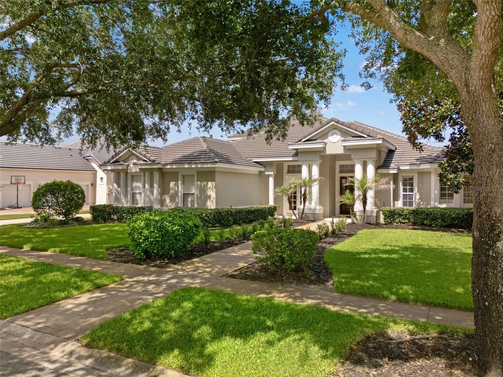 Photo of 10821 Boca Pointe Drive, Orlando, FL 32836 (MLS # O6399851)