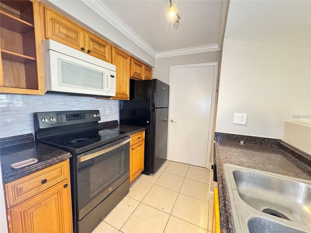 Photo of 3038 Parkway Boulevard #208, Kissimmee, FL 34747 (MLS # S5148583)