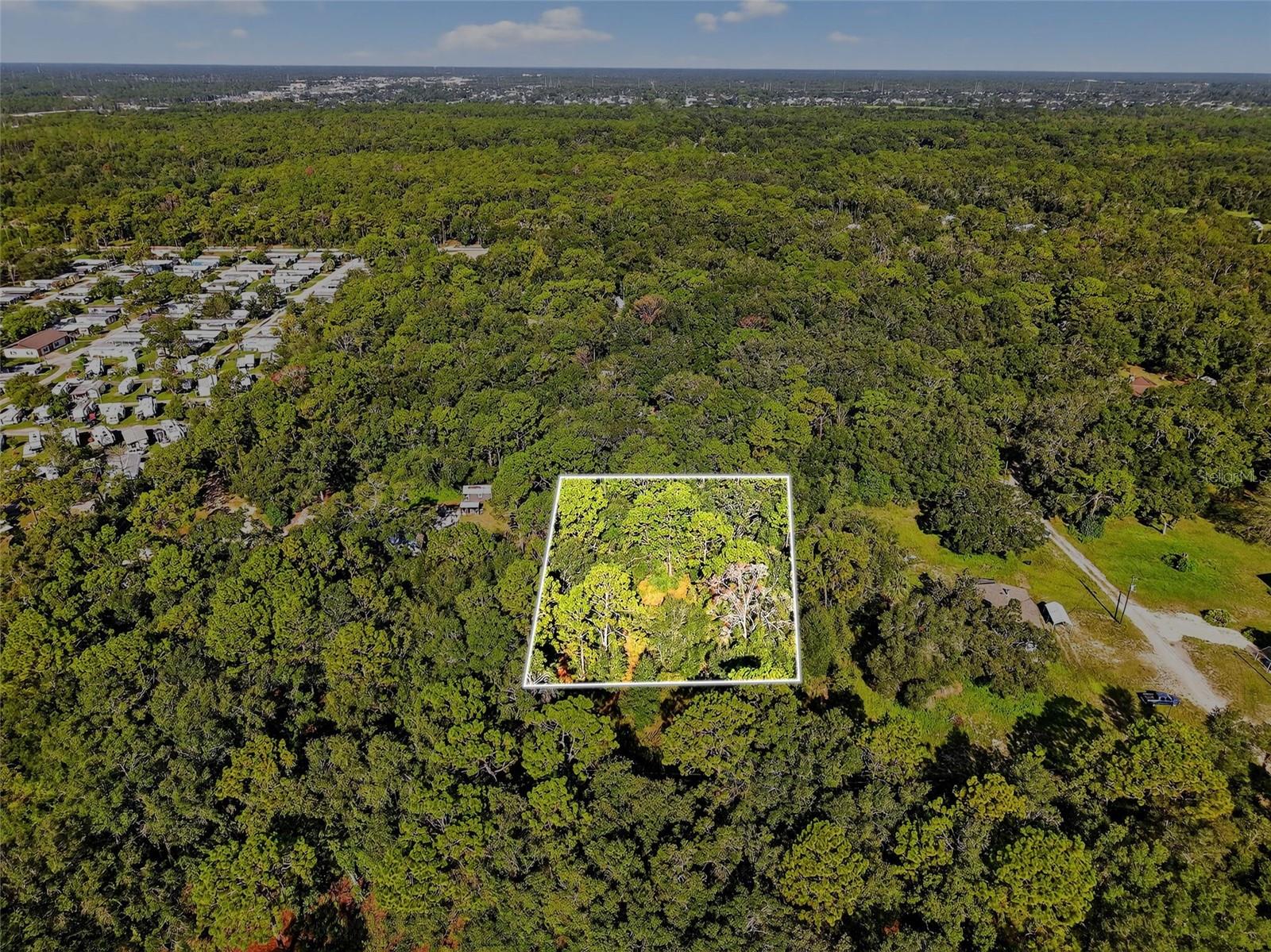 Discover the perfect blend of privacy and convenience with this 1.25-acre vacant lot in Brooksville. Surrounded by trees and local wildlife, this rustic setting offers the ideal backdrop to build your dream home. All with no HOA restrictions! Enjoy the beauty of nature right outside your door with nearby trails and parks, while still being just minutes from dining options, shopping centers, and multiple golf clubs. The location offers excellent access to Cortez Boulevard for easy travel, and you’re less than 20 minutes to Weeki Wachee Springs and just 15 miles from the Gulf beaches. Whether you envision a custom home with plenty of space for outdoor living or a peaceful retreat away from the hustle and bustle, this property offers endless possibilities in a sought-after area of Hernando County.