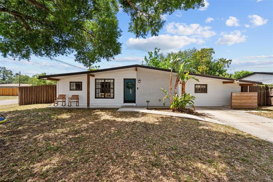 Welcome Home! Step into this charming 3-bedroom, 2-bathroom haven located on a lovely corner lot. With updated living spaces and a generously sized yard, there's plenty of room for your boat or extra parking needs. As you enter through the inviting covered front porch, you'll immediately be captivated by the bright, open floor plan that seamlessly connects the dining area and the beautifully updated kitchen. Imagine whipping up delicious meals in this stylish space featuring a full-wall pantry, a convenient coffee bar, stunning wood cabinets with ample pot drawers, stainless steel appliances, elegant stone countertops, and a trendy herringbone tile backsplash. Plus, the breakfast bar offers even more counter space, perfect for entertaining friends and family! Venture into the separate living room, where you'll find an abundance of space ideal for hosting gatherings or enjoying movie nights. The full-sized laundry area nearby adds convenience, or you can open the French doors to bask in the fresh air of your expansive, fenced backyard. This outdoor oasis boasts a sizable concrete patio, a sturdy shed, and a large gate that easily accommodates an RV or larger boat. Wander back to the serene primary bedroom suite tucked away for your privacy, featuring both a walk-in closet and a spacious secondary closet for all your linens and towels. The en-suite bathroom is a true retreat, complete with a double vanity, a large walk-in shower adorned with sleek subway and penny-round tiles, and a light fixture with a Bluetooth speaker, perfect for setting the mood with your favorite tunes. The secondary bedroom is equally lovely, featuring bi-fold closet doors, blinds, and ceiling fan, along with beautiful engineered hardwoods. Don’t miss the gorgeous secondary bathroom, showcasing stone countertops and a stylish vanity with a shower/tub combo. The guest bedroom/office, just off the dining room, features a trendy handcrafted barn door for added privacy. Schedule your visit today and experience all that this wonderful property has to offer for your living and boat storage needs!