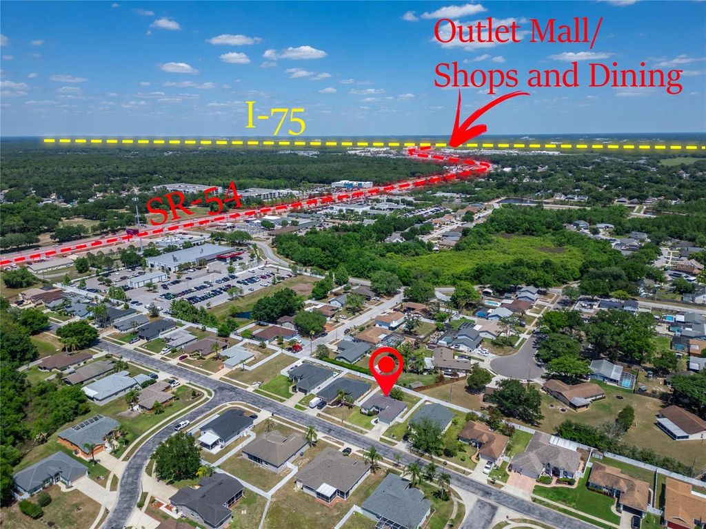 Photo of 1730 Canoe Drive, Lutz, FL 33559 (MLS # TB8500069)