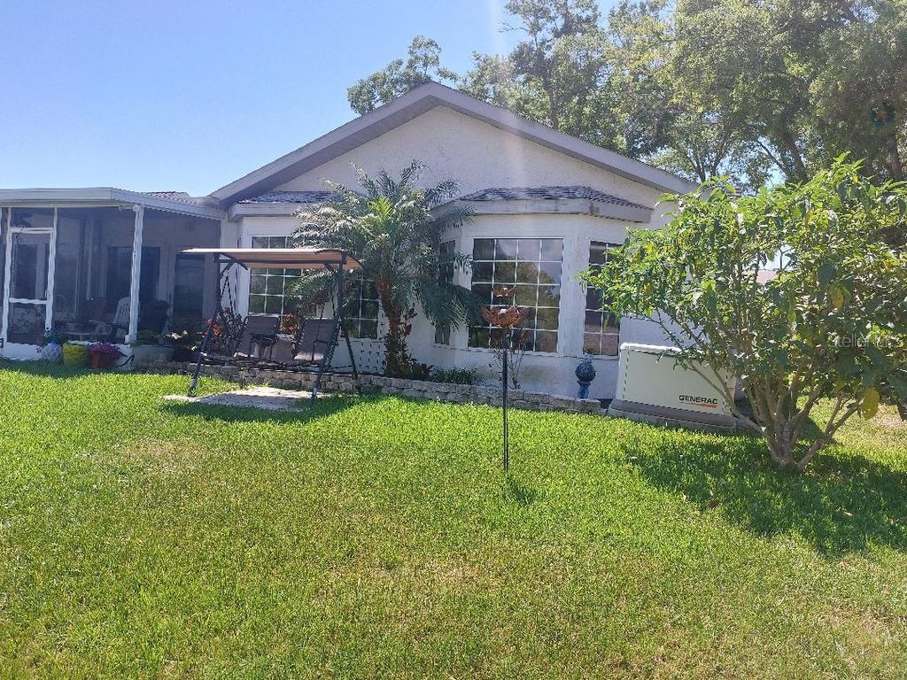 Photo of 1207 Gillespie Drive N, Palm Harbor, FL 34684 (MLS # TB8491462)