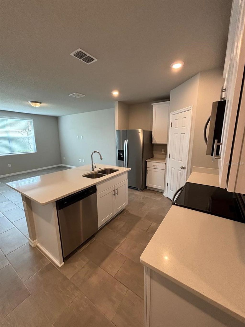 Photo of 431 Legacy Loop, Davenport, FL 33896 (MLS # O6389118)