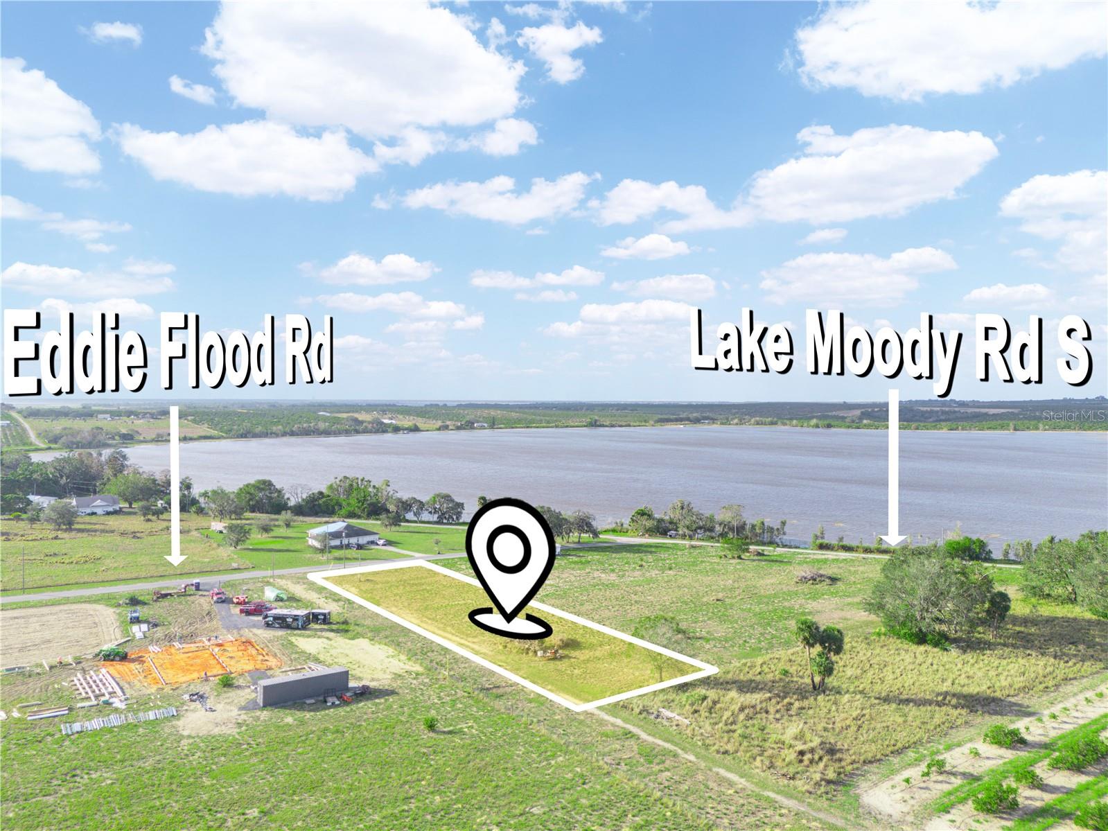 ****DRASTIC PRICE REDUCTION!***
BEAUTIFUL VIEW OF LAKE MOODY AND SURROUNDING AREA FROM THIS .84 ACRE!!! THIS PROPERTY HAS AN AGRICULTURAL WELL TO USE FOR GARDENING, FRUIT TREES OR WHATEVER YOUR DESIRE!!! THIS LOT IS HIGH ON A SMALL BLUFF WITH A PANORAMIC VIEW OF THE SURROUNDING AREA. THERE IS 100 FT ON A PAVED COUNTY MAINTAINED ROAD WITH EASY ACCESS TO SCENIC HWY (ST. RD. 17) TO PROCEED NORTH TO BABSON PARK & LAKE WALES & SOUTH TO FROSTPROOF & HIGHLANDS COUNTY!) THE NEAR ACRE LOT HAS BEEN CLEARED AND HAS AN AGRICULTURAL WELL WITH A SUBMERSIBLE PUMP FOR WATERING CROPS OF MANY VARIETIES INCLUDING ALL VEGETABLE CROPS, CITRUS, AVACADO, MANGO, GRAPES, SOUR SOUP, & MANY MORE! YOU MAY HAVE ANIMALS THAT AREA ALLOWED BY THE CITY OF FROSTPROOF. COME BUILD YOU DREAM HOME! ** PRICE REDUCTION**