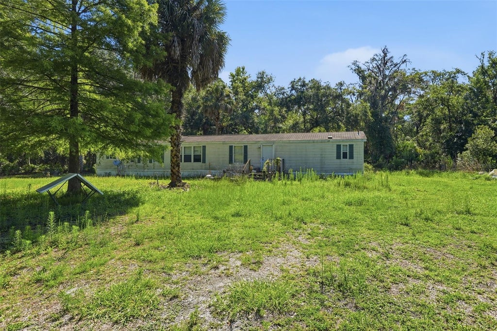 Photo of 6590 E Highway 316, Citra, FL 32113 (MLS # TB8521425)