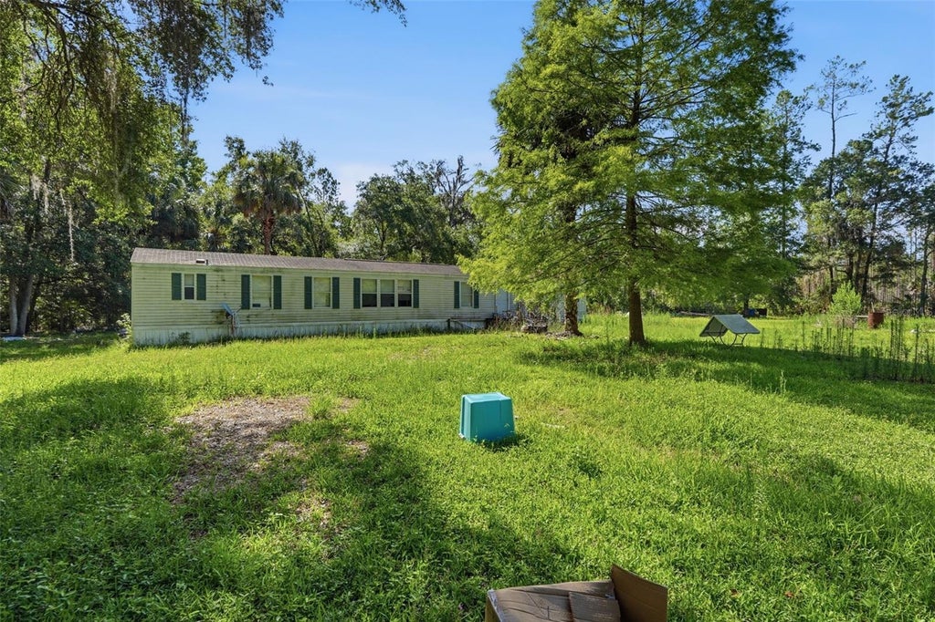 Photo of 6590 E Highway 316, Citra, FL 32113 (MLS # TB8521425)