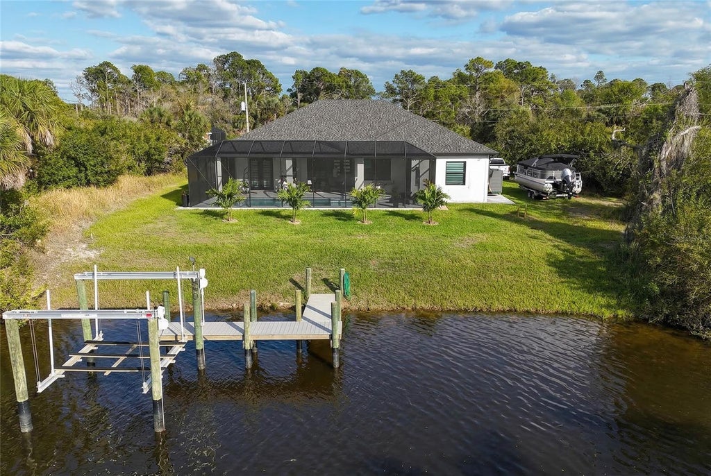 Photo of 1015 Hoffer Street, Port Charlotte, FL 33953 (MLS # C7530802)