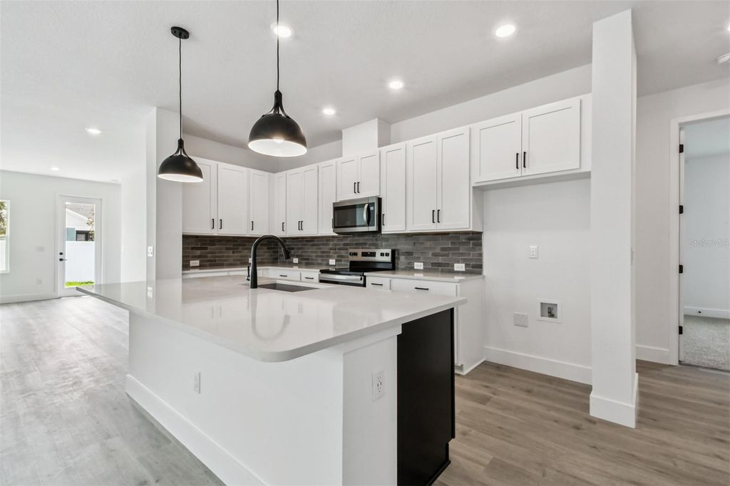 Photo of 11828 Mile Marsh Drive, Riverview, FL 33569 (MLS # TB8426629)