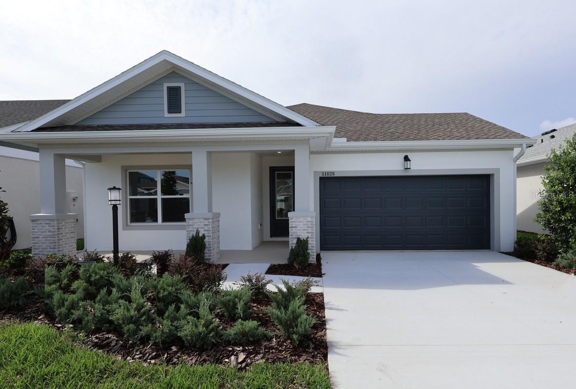 The Sparkman is has 4-bedrooms, 3-bathrooms with an additional study and is move-in ready. The heart of the home is an expansive kitchen with high-end finishes, abundant cabinetry, and a large center island that overlooks the spacious family room. The study offers a quiet retreat for work or hobbies, while the secondary bedrooms provide ample space for family and guests. The luxurious owners retreat is complete with a spa-like en-suite bathroom and an oversized walk-in closet. A two-car garage offers convenience and storage. Act fast before it's gone.