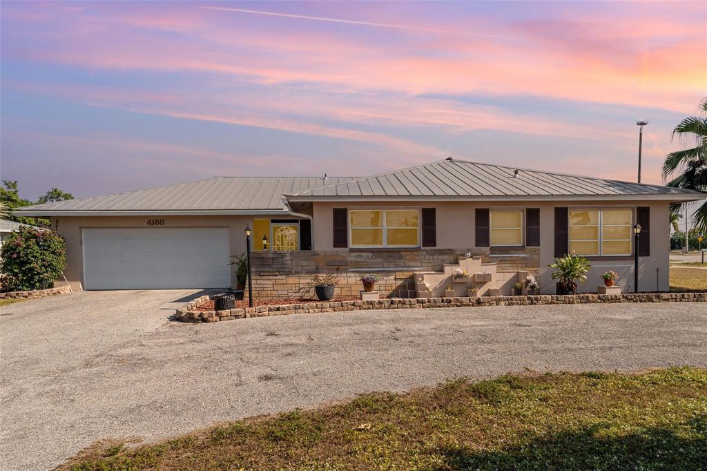 Photo of 4168 Harbor Boulevard, Port Charlotte, FL 33952 (MLS # A4672425)