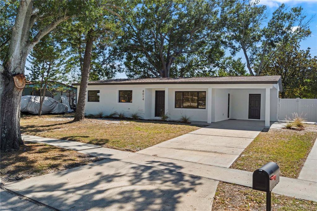 Photo of 8014 W Comanche Avenue, Tampa, FL 33615 (MLS # TB8469154)