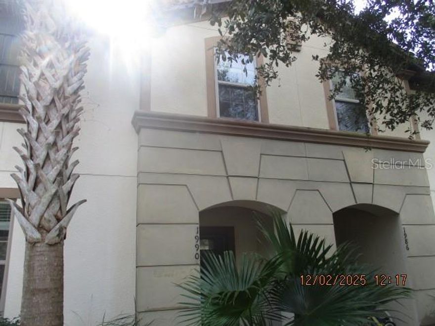 Opportunity knocks - Act FAST - this amazing townhome is not going to last!! HUD Case #094-838280. Sold As-Is and Insurable. Call listing agent to ask about a lender provided RATE BUY-DOWN and closing cost credits! Welcome to 1990 Marjorca Dr...an amazing 4 bedroom 3 1/2 bath townhome located in the highly desired guard gated community of Windsor at Westside, just minutes from all theme parks and approx 45 min from each coast. Full time residence, second home or short term rental - all options are at your disposal. The entry opens to an open floor concept plan with a massive kitchen / family room space that overlooks the outdoor pavered deck and private pool area, with it's own private half bath. Triple sliding glass doors and step out deck, create a relaxing open air environment. The kitchen is equipped with top of the line stainless steel appliances, granite countertops and plenty of cabinet space to host your events! The community has a truly resort style pool, lounge, lazy river, water slide, hot tub, volleyball, basketball, tennis and fitness center...or, chill out poolside in your private cabana!