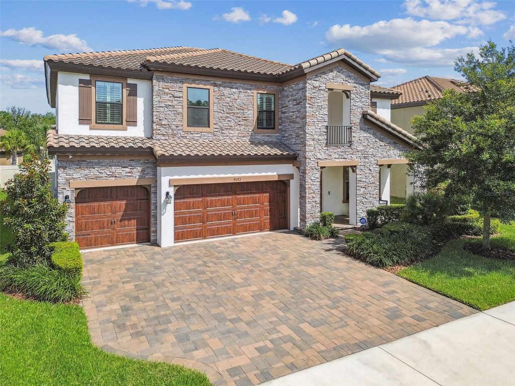 Photo of 4083 Woods Rider Loop, Odessa, FL 33556 (MLS # W7876435)