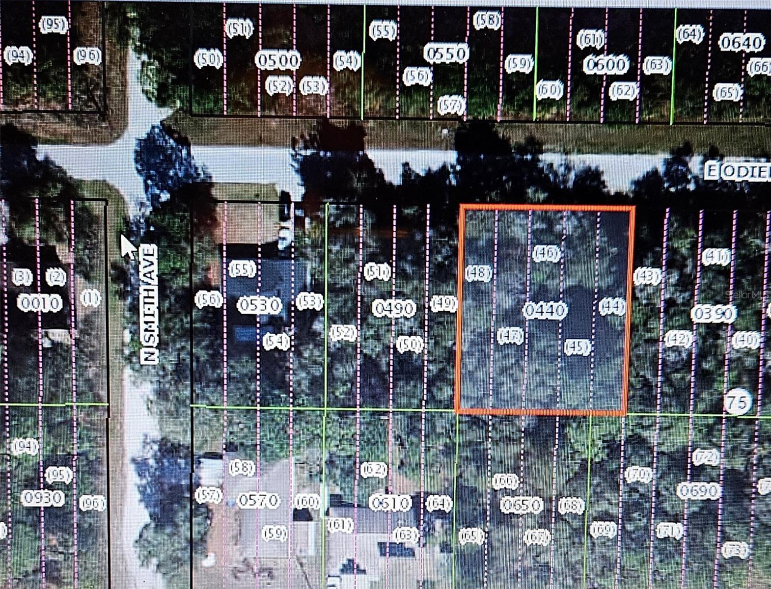 Wooded building lot in residential area. Site built homes no mobiles allowed. Dry land. Flood zone X