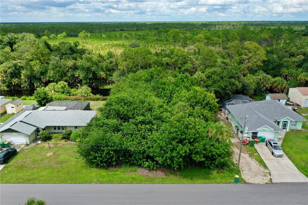 Photo of 10118 Charlemont Avenue, Englewood, FL 34224 (MLS # C7530327)