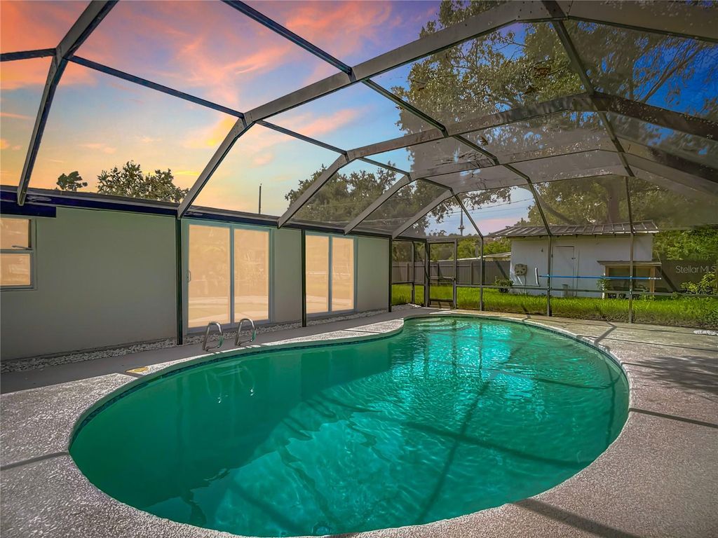 Photo of 2402 E 148th Avenue, Lutz, FL 33549 (MLS # TB8429186)