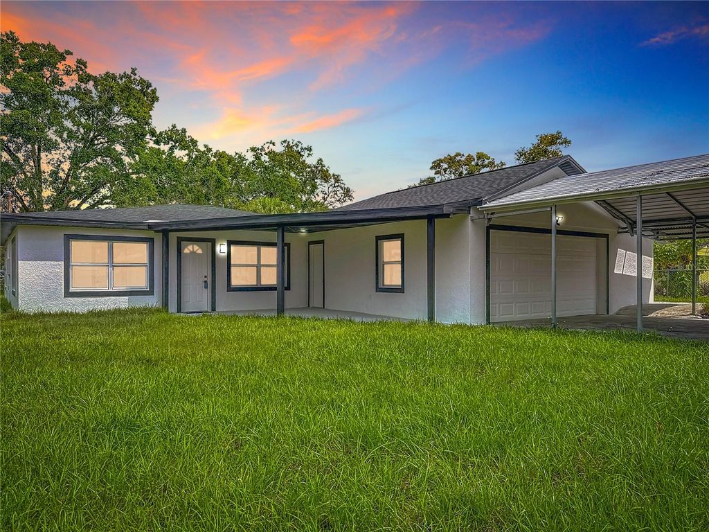 Photo of 2402 E 148th Avenue, Lutz, FL 33549 (MLS # TB8429186)