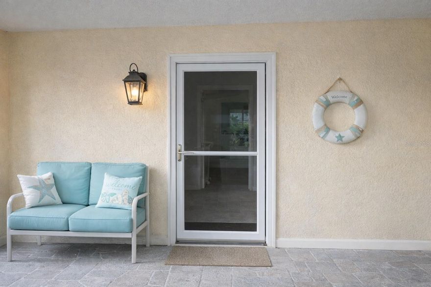 Beautifully updated coastal residence just a short walk to the beach. This move in ready home features plantation shutters, granite countertop, stainless steel appliances, new cabinetry ceiling, fans, and beautiful flooring throughout the first rear office, guest area, office, private exterior access, providing excellent flexibility for work from home or visiting guest. A spacious utility room, currently used as a closet, offer potential for future expansion as seen as similar units. Enjoy a covered outdoor sitting area With rear access, conveniently located that Indian rock Beach, dining and shopping. A wonderful opportunity to own a thoughtfully, updated beach area home.