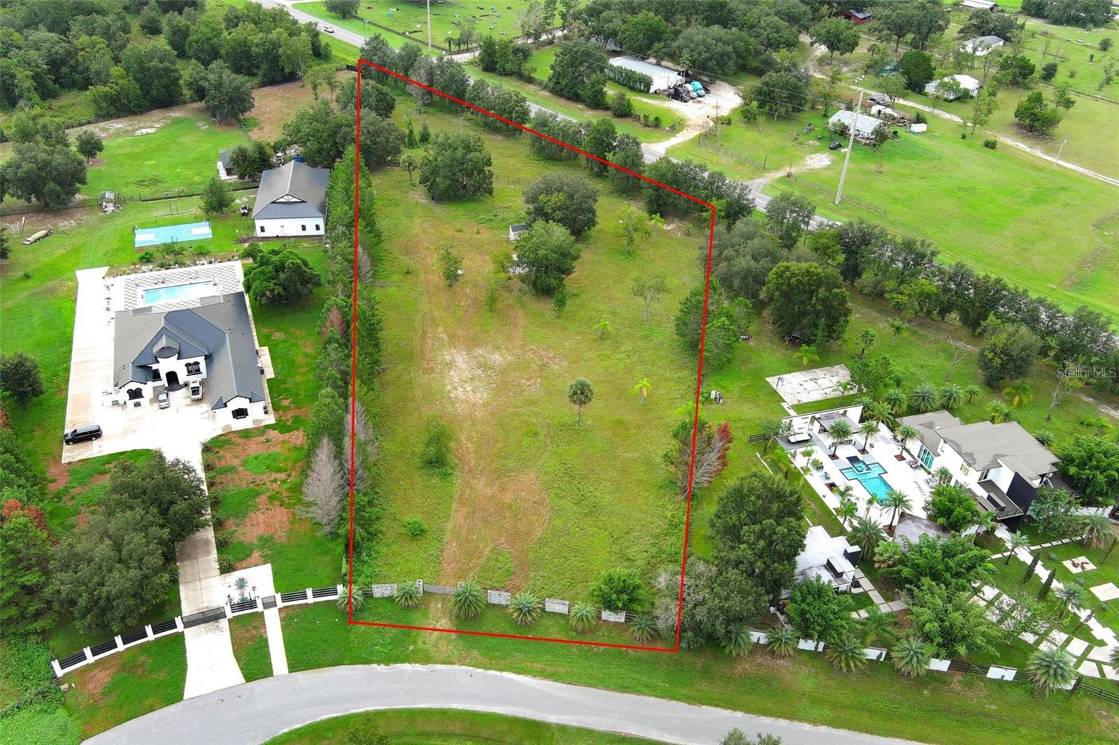 Build your Dream Home on 3.53 Acres - Luxury Custom Homesite with Upgrades
Welcome to Lot 2 of 11 exclusive homesites in this private neighborhood, offering the perfect setting for your dream custom residence. With the freedom to choose your own builder, you can create a luxury home that fits your vision. Deed restrictions require a minimum of 2,400 sq. ft.
This property already includes major upgrades: metal wire fencing, electricity, private well, septic system with 1 bathroom, storage shed with concrete floor, and a gazebo with fire pit for outdoor enjoyment.
A prime, ready-to-build lot offering privacy, space, and endless possibilities for your custom luxury home.