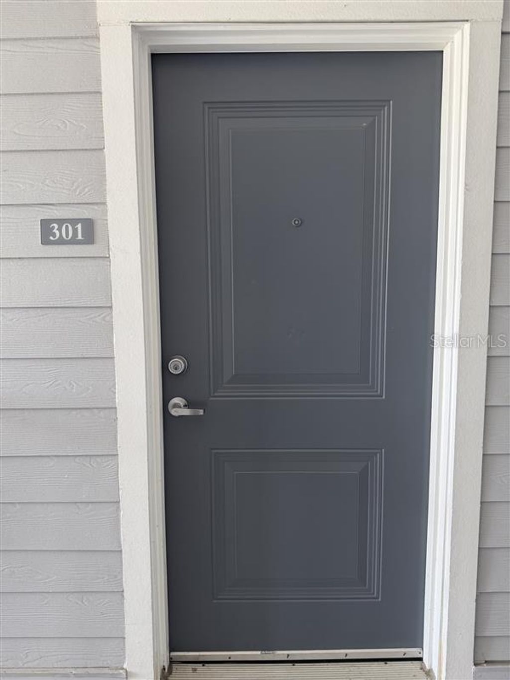 Photo of 560 Academy Drive #301, Kissimmee, FL 34744 (MLS # O6396562)