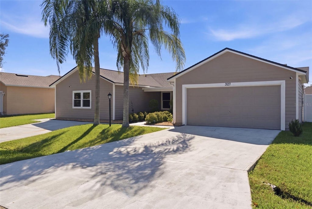 Photo of 327 Marquee Drive, Kissimmee, FL 34758 (MLS # O6451220)