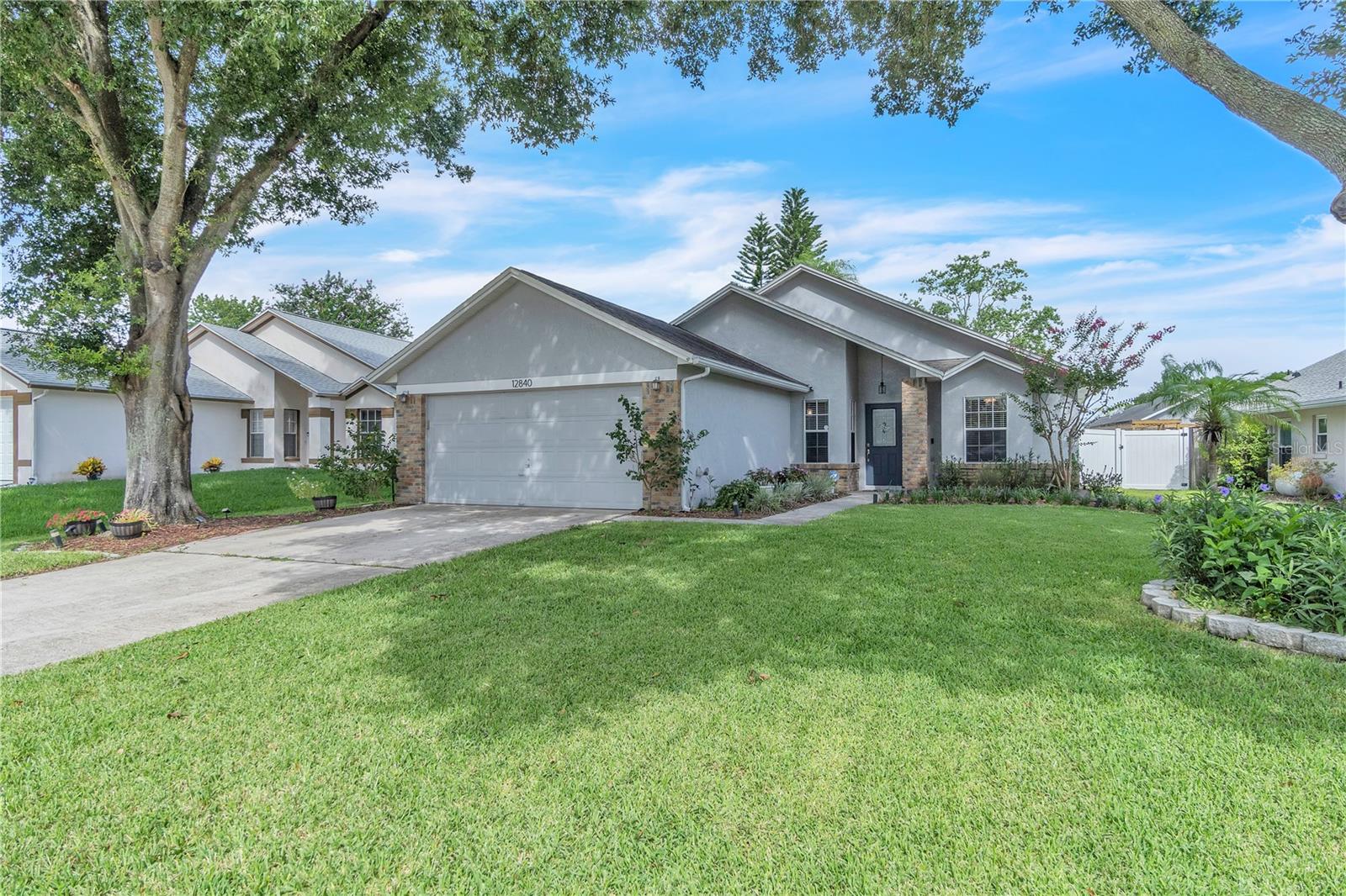 WELCOME HOME TO WATERFORD LAKES! Step right in and call this beautifully updated 3-bedroom, 2-bathroom home your own! With major updates already completed—Roof (2015), AC (2017), and full re-plumb (2015)—this home is move-in ready and waiting for its next proud owner. Upon entering, you'll be greeted by a fully renovated kitchen, filled with natural light and located just off the dining room—perfect for hosting and everyday living. To the right, you’ll find two spacious bedrooms and a fully remodeled bathroom. The home’s open-concept Great Room provides plenty of space for relaxing or entertaining, while the primary suite offers privacy on the opposite side, complete with a fully updated en-suite bathroom. Step outside to your backyard oasis—an entertainer’s dream! Whether it’s weekend BBQs, evening stargazing, or simply relaxing under the solidly built pergola, this outdoor space is designed for enjoyment year-round. Located in the highly sought-after Waterford Lakes community, this home is surrounded by top-rated schools and just minutes from shopping, dining, and major highways including the 408, 417, and 528. Enjoy easy access to UCF, Valencia College, Seminole State, Research Park, Siemens, Lockheed Martin, and Orlando International Airport. Don’t miss your chance to own this exceptional home—schedule your private showing today before it’s SOLD!