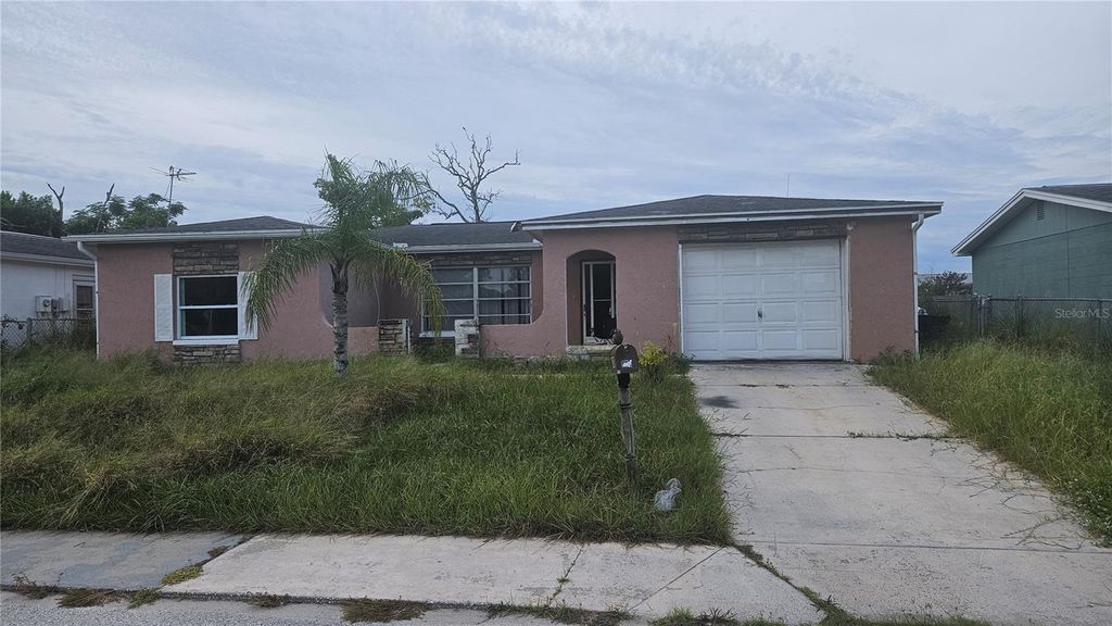 Photo of 8428 Paxton Drive, Port Richey, FL 34668 (MLS # TB8458777)