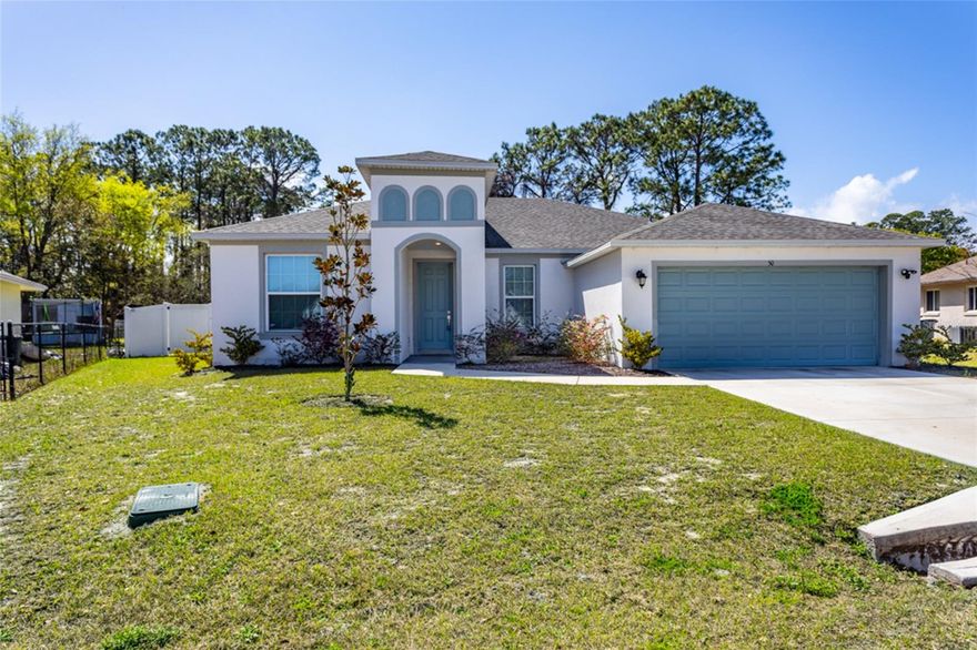 One or more photo(s) has been virtually staged. Experience the pinnacle of modern Florida living in this stunning, newly built 2024 residence situated in the desirable Palm Harbor neighborhood of Palm Coast. This 4-bedroom, 2-bathroom masterpiece offers the perfect blend of unique design and functional luxury.

Step through the front door into an expansive open-concept living space bathed in natural light, featuring high ceilings and premium finishes throughout. The gourmet kitchen is a true showstopper, boasting exquisite quartz countertops, sleek cabinetry, and a layout designed for effortless entertaining. This fully fenced home offers plenty of room for an inground pool for the whole family to endulge in on a summer day.
