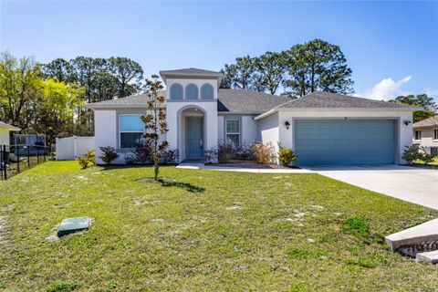 Photo of 50 Folson Lane, Palm Coast, FL 32137 (MLS # FC316733)