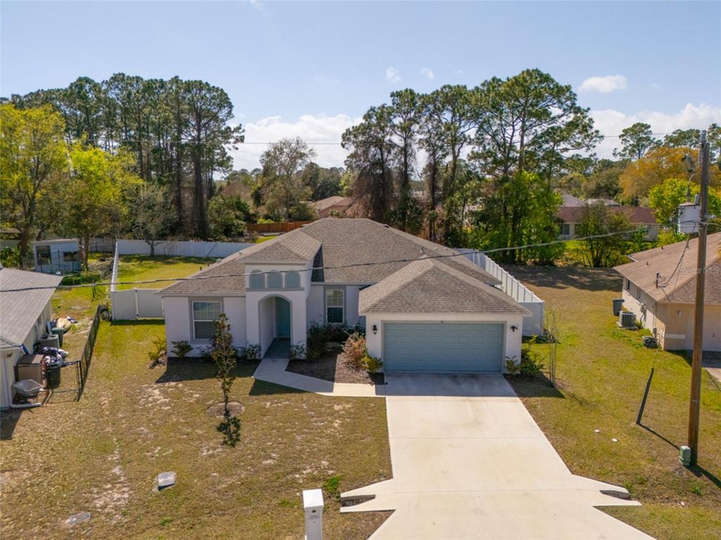 Photo of 50 Folson Lane, Palm Coast, FL 32137 (MLS # FC316733)
