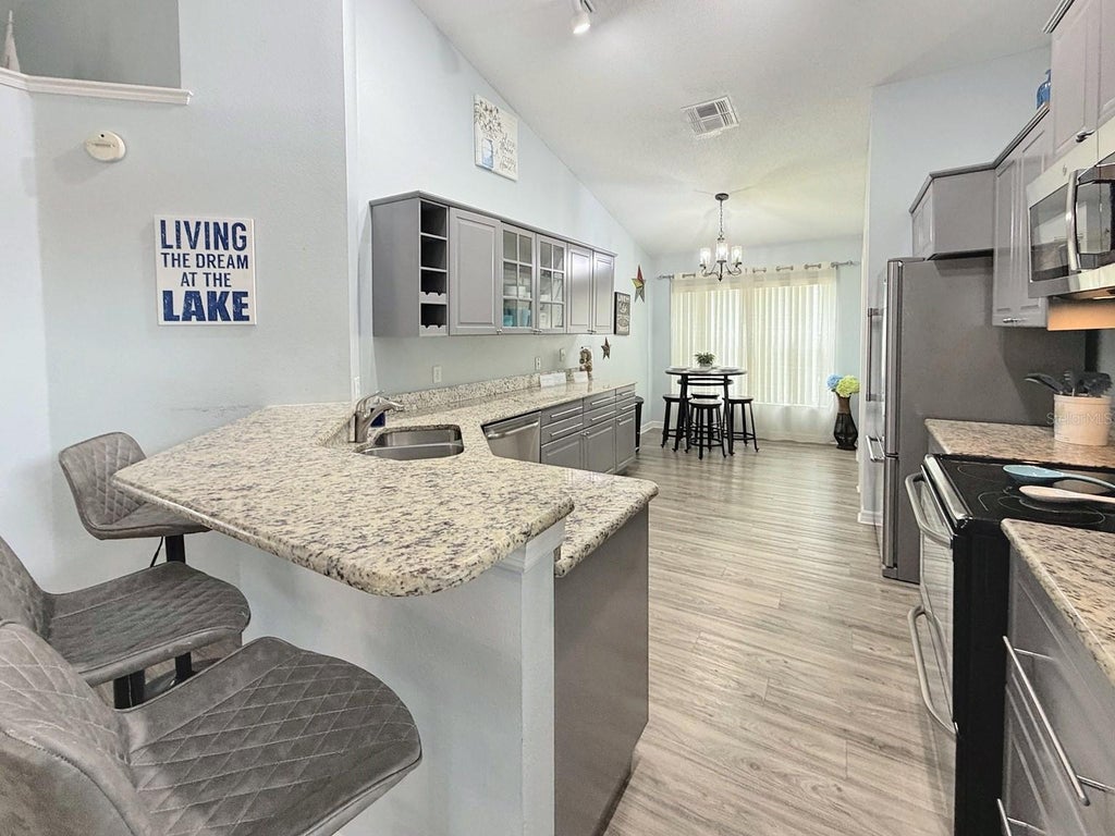 Photo of 604 Eagle Pointe S, Kissimmee, FL 34746 (MLS # O6449189)