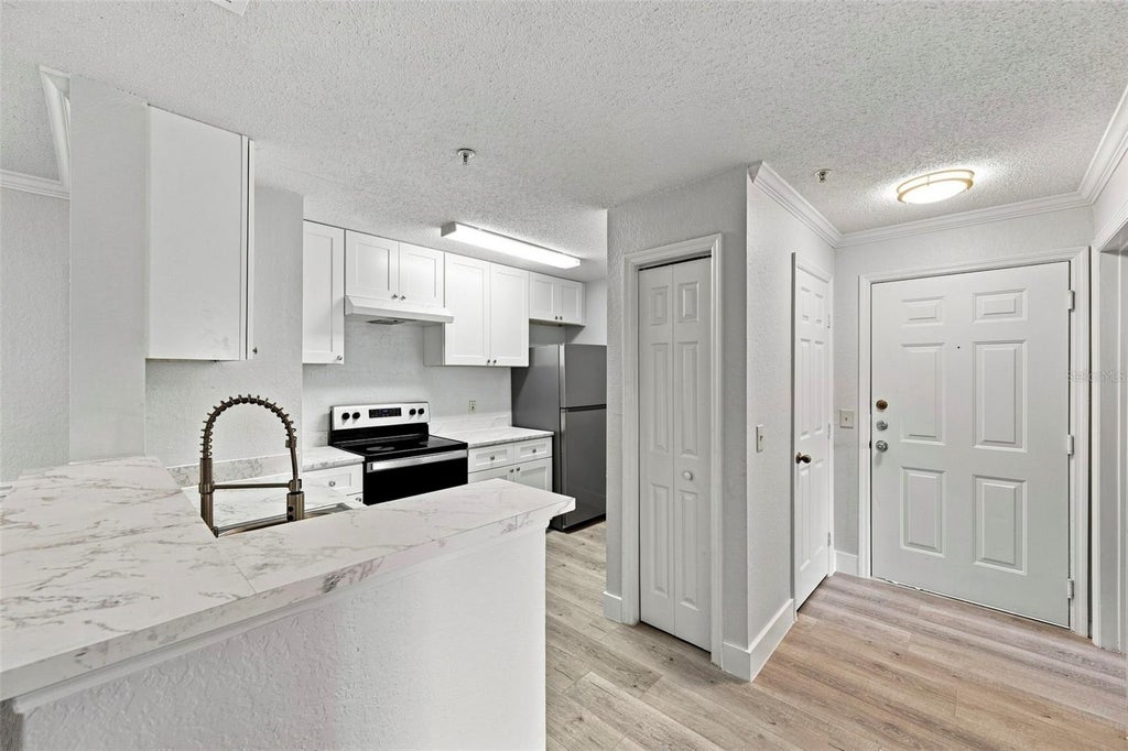 Photo of 18001 Richmond Place Drive #136, Tampa, FL 33647 (MLS # TB8541588)
