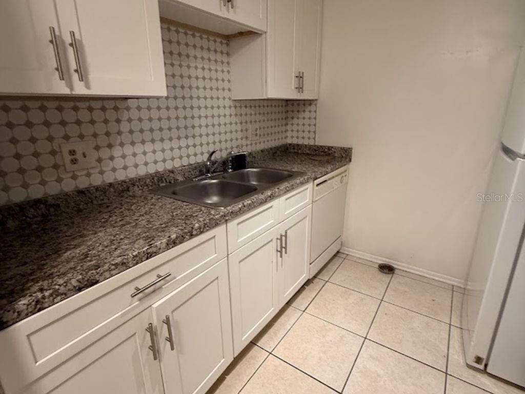 Photo of 4818 S Semoran Boulevard #503, Orlando, FL 32822 (MLS # S5147842)