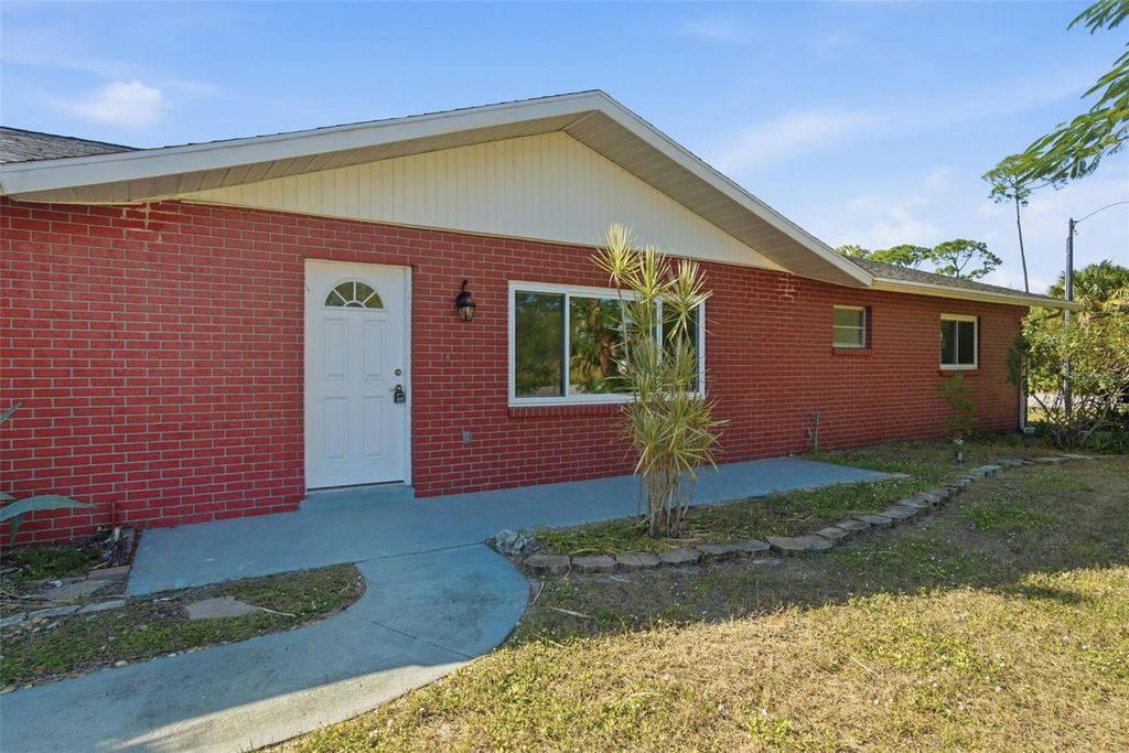 Photo of 801 Mcmahon Avenue NW, Port Charlotte, FL 33948 (MLS # C7513535)