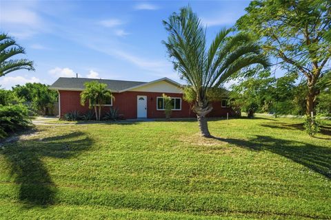 Photo of 801 Mcmahon Avenue NW, Port Charlotte, FL 33948 (MLS # C7513535)