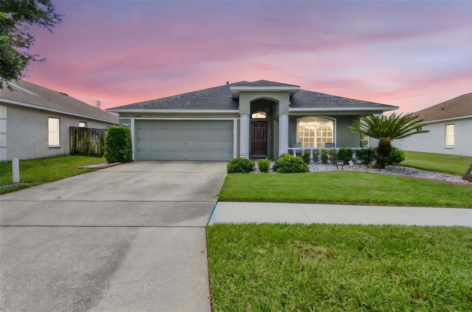 Welcome to your Florida dream home! This spacious 4-bedroom, 2-bath, single-story gem offers over 2,000 square feet of beautifully designed living space. From the moment you step inside, the marble foyer sets the tone for elegance. Enjoy the formal living and dining rooms?perfect for entertaining?plus an eat-in kitchen featuring granite countertops, a wine refrigerator, a breakfast bar, and plenty of space for gathering. Start your mornings with coffee on the charming front porch and unwind in the evenings on the extended lanai overlooking peaceful pond views in both the front and back. This home blends comfort, style, and serenity?don't miss your chance to make it yours!