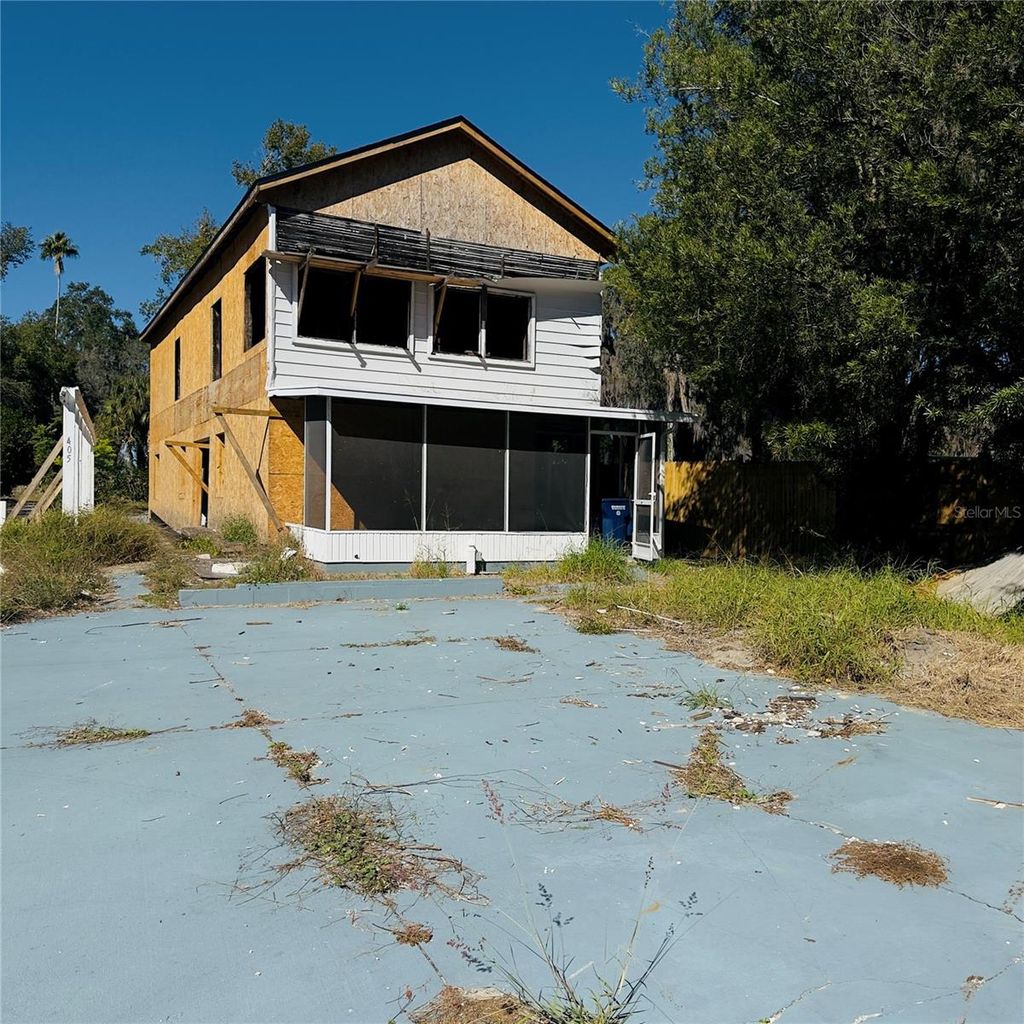 Photo of 405 W Lake Elbert Drive NE, Winter Haven, FL 33881 (MLS # O6374774)