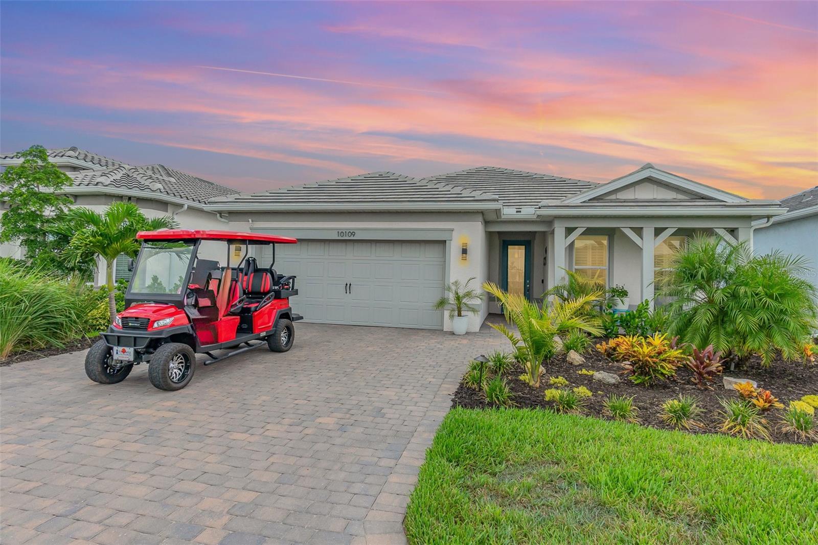 *** THIS IS THE ONE!***. Your search for the perfect Florida lifestyle ends here! Welcome to refined coastal living in this immaculate MYSTIQUE 3-BEDROOM, 3-BATHROOM residence with versatile FLEX ROOM, perfectly suited for an office, den, or creative retreat. From the moment you arrive, you’re welcomed into a world of elegance. Greeted by GLASS FRONT DOOR lush landscaped grounds & KEY WEST–STYLE ELEVATIONS, setting a tone of coastal grandeur. Refined luxury abounds with TRAY CEILINGS gracing both the GREAT ROOM & PRIMARY retreat, creating soaring volumes & serene ambiance. The GREAT ROOM is a showstopper, anchored by an ACCENT WALL, a striking CUSTOM FIREPLACE, & FULL CUSTOM BAR ideal entertaining. The GOURMET KITCHEN, where MODERN SHAKER CABINETS meet premium QUARTZ COUNTERTOPS and top-tier KitchenAid APPLIANCES. A sleek island invites cooking & conversation, framed by seamless CERAMIC TILE floors that flow throughout. Each bedroom is wrapped in character with a CUSTOM ACCENT WALL, while the LAUNDRY ROOM continues the upscale design trend with matching UPGRADED SHAKER CABINETS. Security, efficiency, & peace of mind come standard with HIGH-IMPACT HURRICANE WINDOWS & DOORS. Step into the private LANAI, where a serene lake view sets the backdrop for your SALT-SYSTEM POOL & its elegant WATERFALL FEATURE a tranquil retreat that blends artistry and function. Step outside to your private LANAI, where a serene POOL WITH WATERFALL FEATURE overlooks a peaceful lake offering a resort-style backdrop and a tranquil escape. The GARAGE is equally impressive, featuring durable EPOXY FLOORS, built-in STORAGE RACKS, & 4-FOOT EXTENSION for added space and functionality. Imagine waking each morning surrounded by lush landscaping and serene lakes. This hidden gem unfolds like a private sanctuary, blending upscale living with the gentle rhythm of coastal life. Enjoy the TROPICAL SALTWATER RESORT-STYLE POOL WITH LAP LANES & sparkling HEATED SPA beckon under swaying palms, your personal oasis for relaxation or friendly gatherings. The community’s CLUBHOUSE WITH GRAND VERANDA sets the tone for gracious living featuring elegant PARTY ROOMS, a welcoming lounge, and a STATE-OF-THE-ART FITNESS CENTER complete with movement studios & group classes. Active residents come together on well-maintained SPORTS COURTS: 10 PICKLEBALL, 5 TENNIS, and 6 BOCCE BALL COURTS—perfect for friendly matches or social play with neighbors. Afternoon strolls take you past the LAKESIDE BOARDWALK WITH PIER & GAZEBO, fire pits flicker at dusk, and landscaped GARDEN SPACES, trails, & DOG PARK create gathering spots woven into nature’s calm embrace. Dine at the HIGH TIDE BAR & GRILL POOLSIDE for casual bites & cocktails with water views, while a FUTURE LAKESIDE RESTAURANT promises elevated dining soon overlooking glistening lakes. Take a leisurely GOLF-CART RIDE—just 2.5 MILES—to MANASOTA KEY BEACH, BLIND PASS, and ENGLEWOOD BEACH, and enjoy easy access to charming WATERFRONT RESTAURANTS, & BEACH SHOPS.
Around the corner, discover a world-class lineup of CHAMPIONSHIP GOLF COURSES, offering lush fairways, scenic water features, and courses that cater to every skill level.
Boating adventures and waterfront dining are also at your fingertips—whether casting off from nearby marinas or savoring fresh seafood just minutes away. In this setting, every day feels like a luxurious vacation—a life of sun, leisure, and coastal sophistication calling your name. (REVIEW VIDEO)