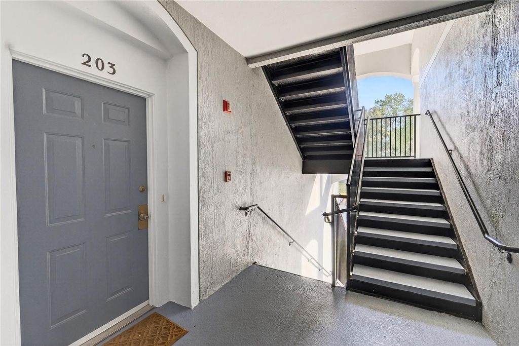 Photo of 8101 Coconut Palm Way #203, Kissimmee, FL 34747 (MLS # O6365850)