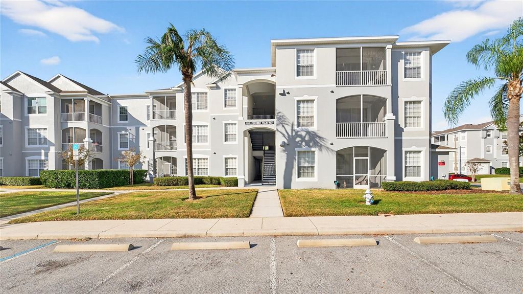 Photo of 8101 Coconut Palm Way #203, Kissimmee, FL 34747 (MLS # O6365850)