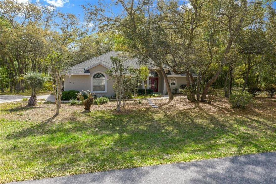 Custom-Built Home on Nearly ½ Acre | New Roof 2022 | Light-Filled & Move-In Ready
Welcome to this stunning custom-built home in the desirable community of Citrus Springs, perfectly situated on nearly half an acre (.46 acres) in a peaceful, serene setting surrounded by trees and nature.
From the moment you arrive, the large front porch sets the tone for relaxed Florida living. Step inside and you’re greeted by a bright, open layout featuring cathedral ceilings, palladium windows, and an abundance of natural light that fills the home.
At the heart of the home is a breathtaking Great Room with soaring cathedral ceilings, a cozy gas fireplace, and built-in display shelves, creating a warm yet elegant space for both everyday living and entertaining. Triple sliding glass doors seamlessly connect the indoors to the large screen-enclosed lanai, perfect for enjoying Florida’s year-round lifestyle.
The thoughtfully designed split floor plan offers privacy and functionality with 3 bedrooms and 2 bathrooms. The Owner’s Suite is a true retreat with ample room. Featuring tray ceilings, sliding glass doors overlooking the lanai, two large walk-in closets, an en-suite bath, linen closet, his and her sinks, a large walk-in shower, and a bidet. 
The kitchen is equally impressive, showcasing custom cabinetry with built-in pots & pans drawers, ample prep space, a large pantry, plus both a breakfast nook and formal dining room, ideal for casual mornings or hosting guests.
Additional highlights include:
3 adjoining lots are also available for purchase, adding an additional .82 acre (Totaling 1.28 acres). New roof (2022), Dedicated laundry room, Oversized 2-car garage, Double front doors, Gutters, Sprinklers, Expansive yard with endless possibilities. 
Located in a quiet area with no HOA, yet close to shopping, dining, golf, and Florida’s beautiful springs and outdoor recreation.
Homes like this with space, character, and custom features don’t come around often. Don’t miss your opportunity to own this special property and create lasting memories for years to come.
Schedule your private showing today!