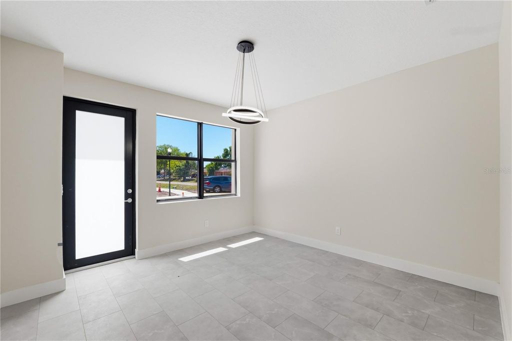 Photo of 8460 Modano Place, Tampa, FL 33614 (MLS # TB8489080)