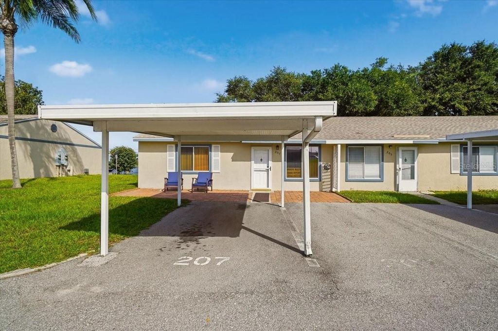 Photo of 207 Winter Ridge Boulevard #4, Winter Haven, FL 33881 (MLS # P4939300)